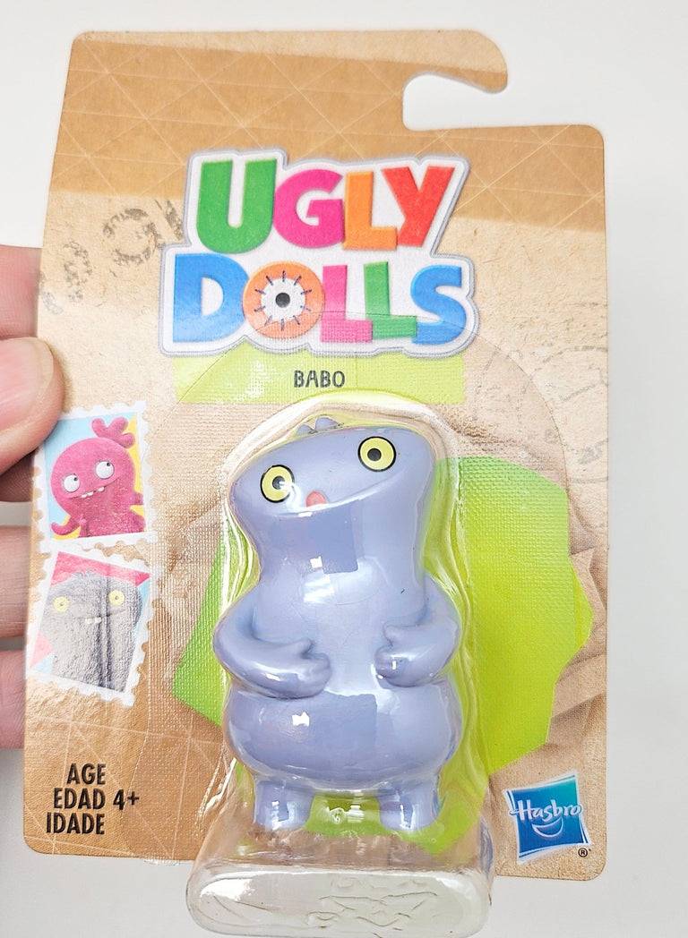 Innenmodell „UglyDolls von Hasbro" - Babo - lila - 28 x 50 mm - Schneekugelhaus