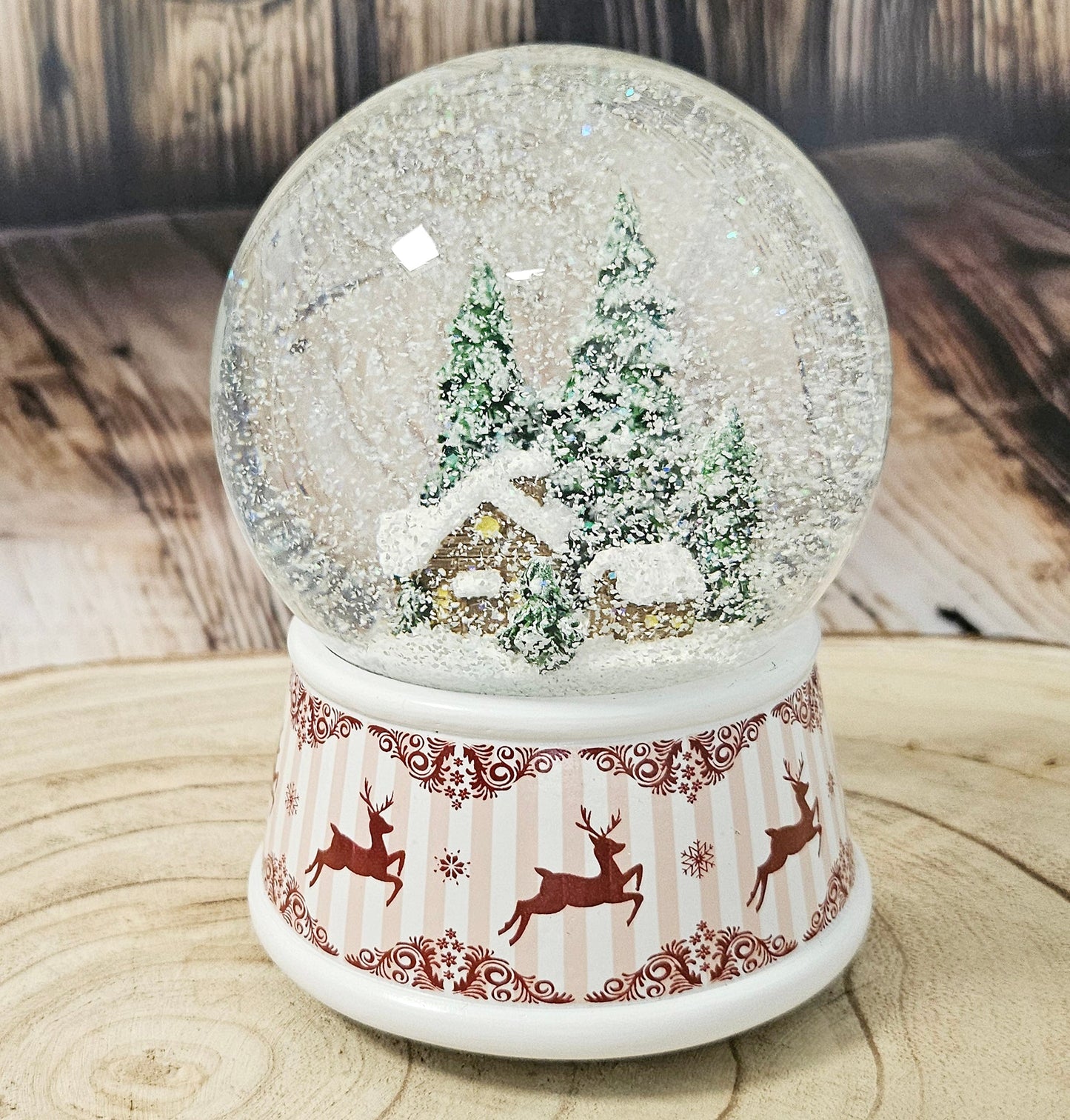 Nostalgische Schneekugel Berghütte Hüttenzauber 100 mm Durchmesser mit Spieluhr - Schneekugelhaus